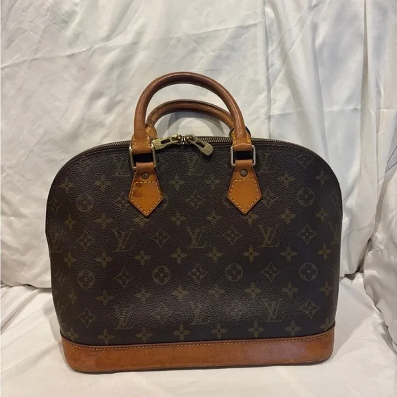 Louis Vuitton Alma Monogram Coated Canvas Handbag - Picture 3 of 16